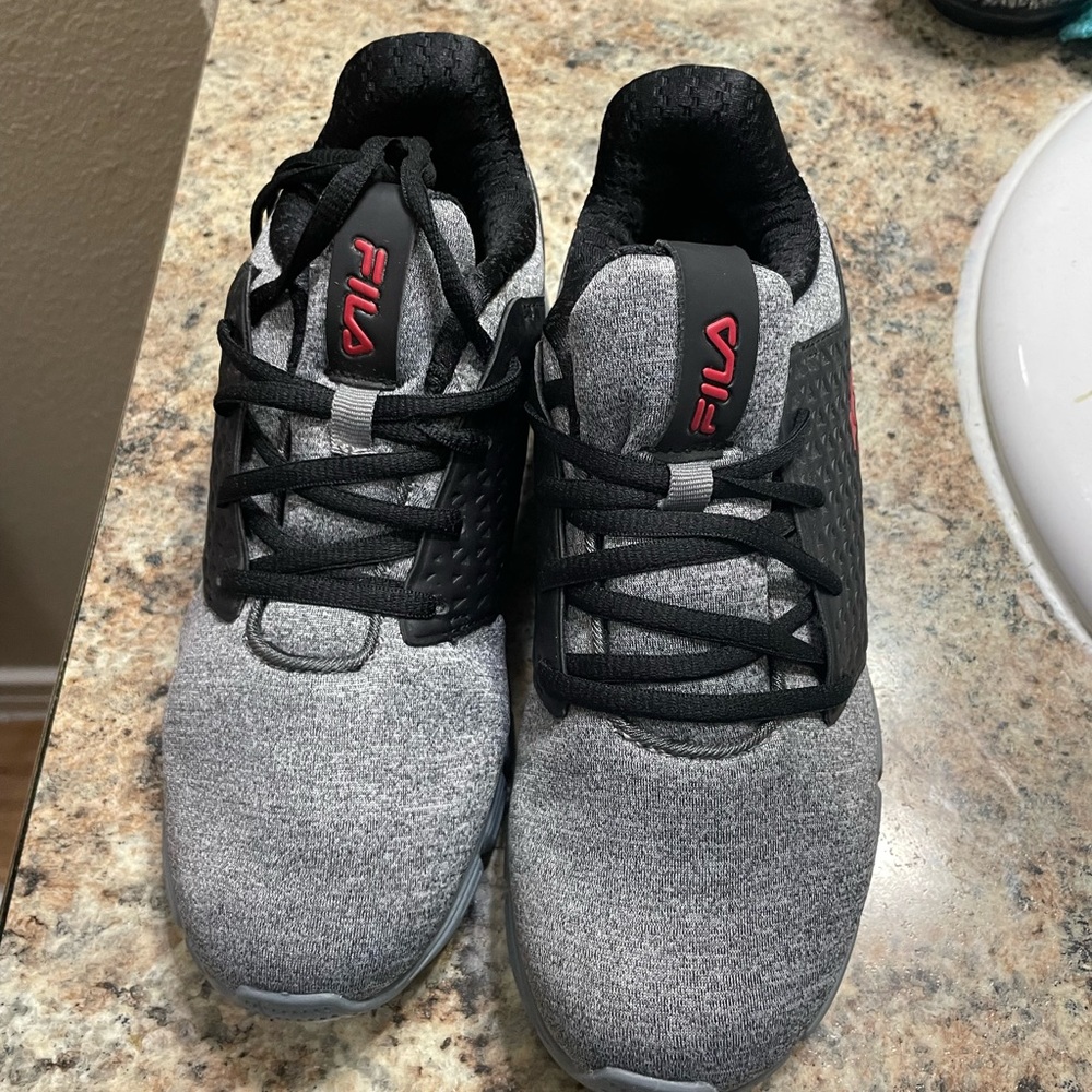 Fila red black and grey Brand New size 6y or size 7.5 womens